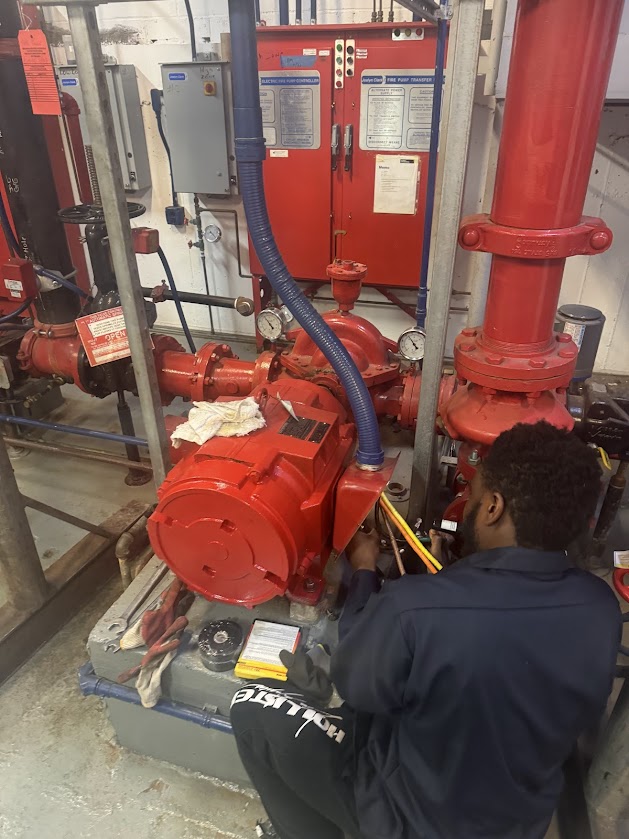 Technician servicing fire pump system at A2Z Pump Repair NYC